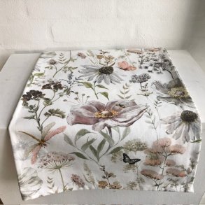 Dug i kologisk bomuld med motiver af blomster og insekter.