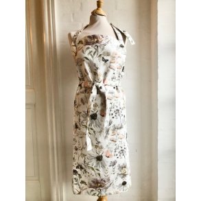 Forklde i kologisk lys bomuld med blomster og insekter.