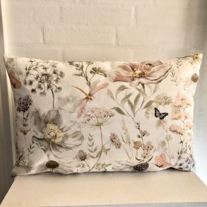 Pude/ sofapude /designpude i �kologisk bomuld med blomstermotiv.
