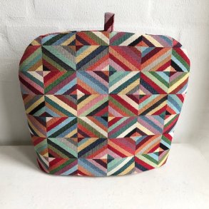 Tehtte i gobelin i mange farver med skr striber.