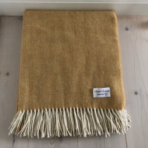 Plaid / t�ppe i recycled uld i en bl�d kvalitet.