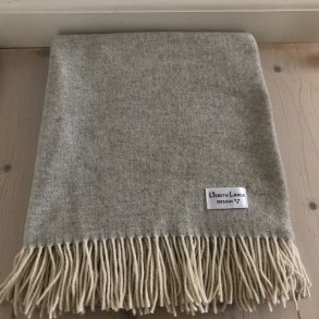 Plaid / tppe i lys gr recycled uld.