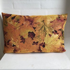 Pude , sofapude , designpude i gobelin i gyldne farver.