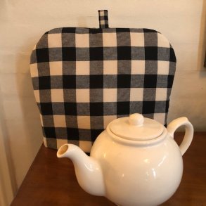 Tehtte i ternet stof i sort og offwhite