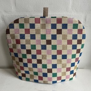 Teh�tte i gobelin med firkanter i forskellige farver