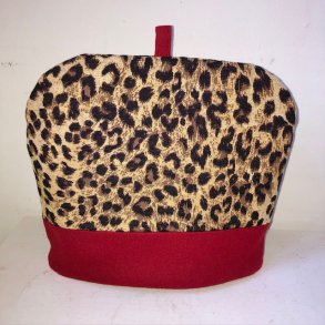 Tehtte , tevarmer i gobelin med leopard mnster og rd uld.